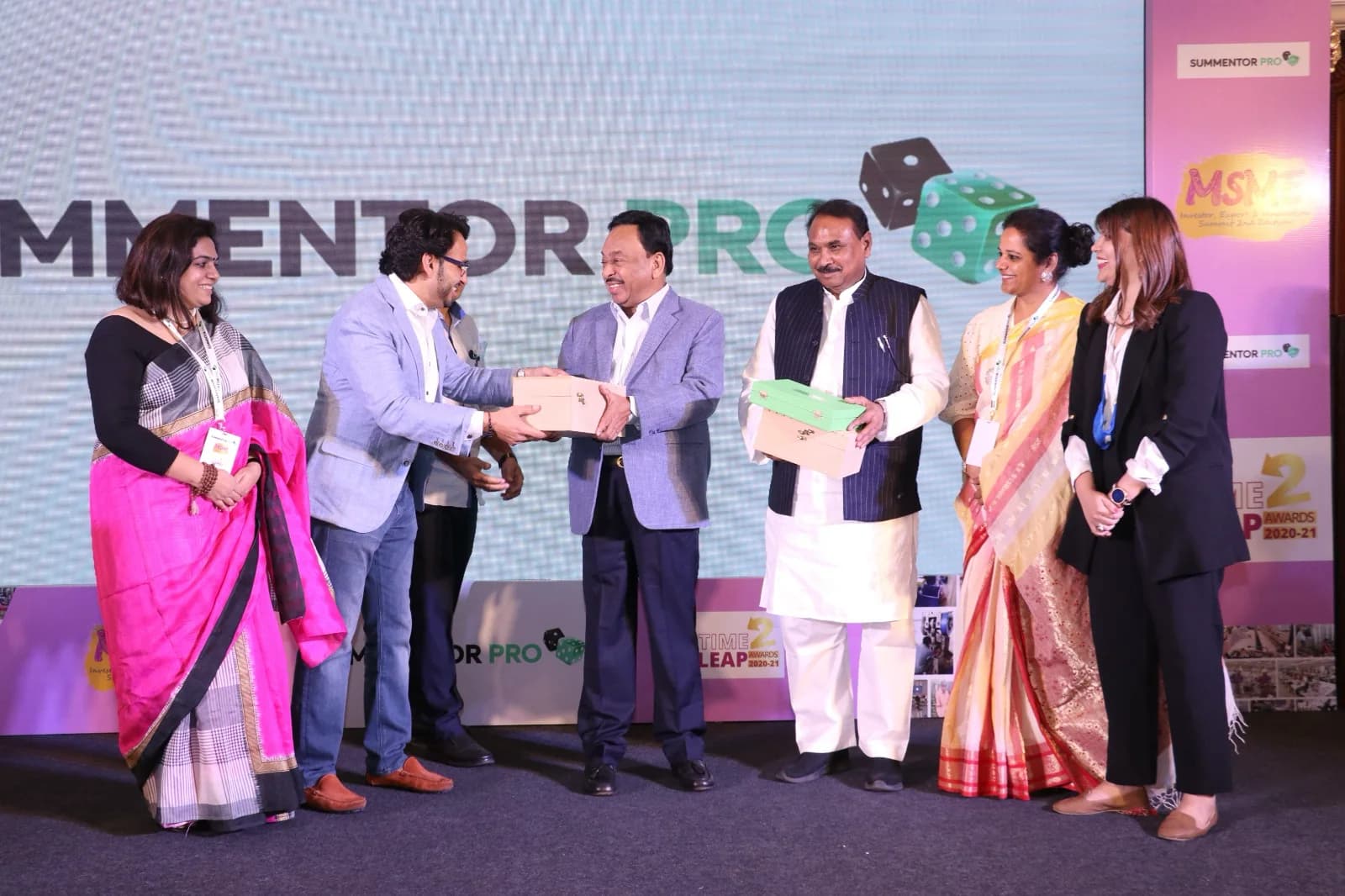 Awards being presented on stage at a previous edition of the summit.