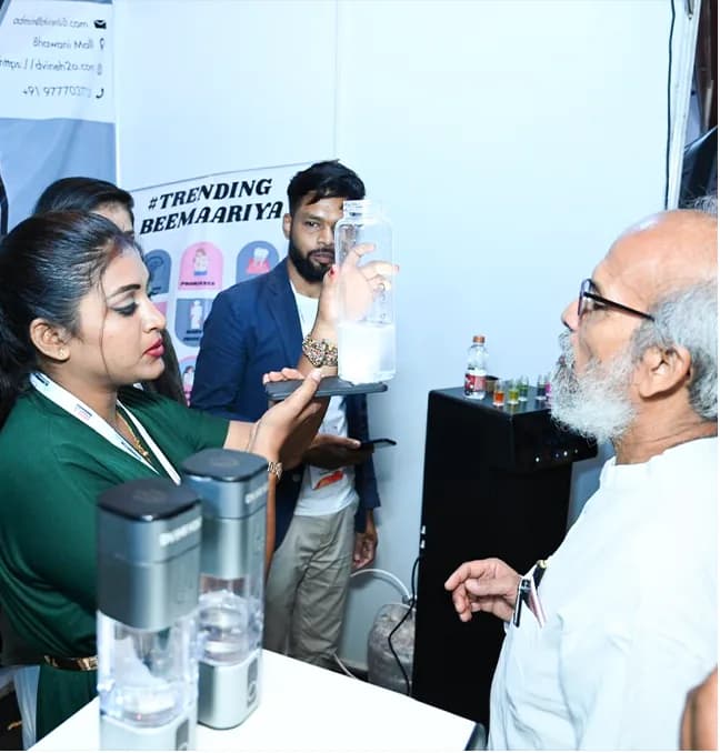 An interview being conducted near an exhibitor's stall.