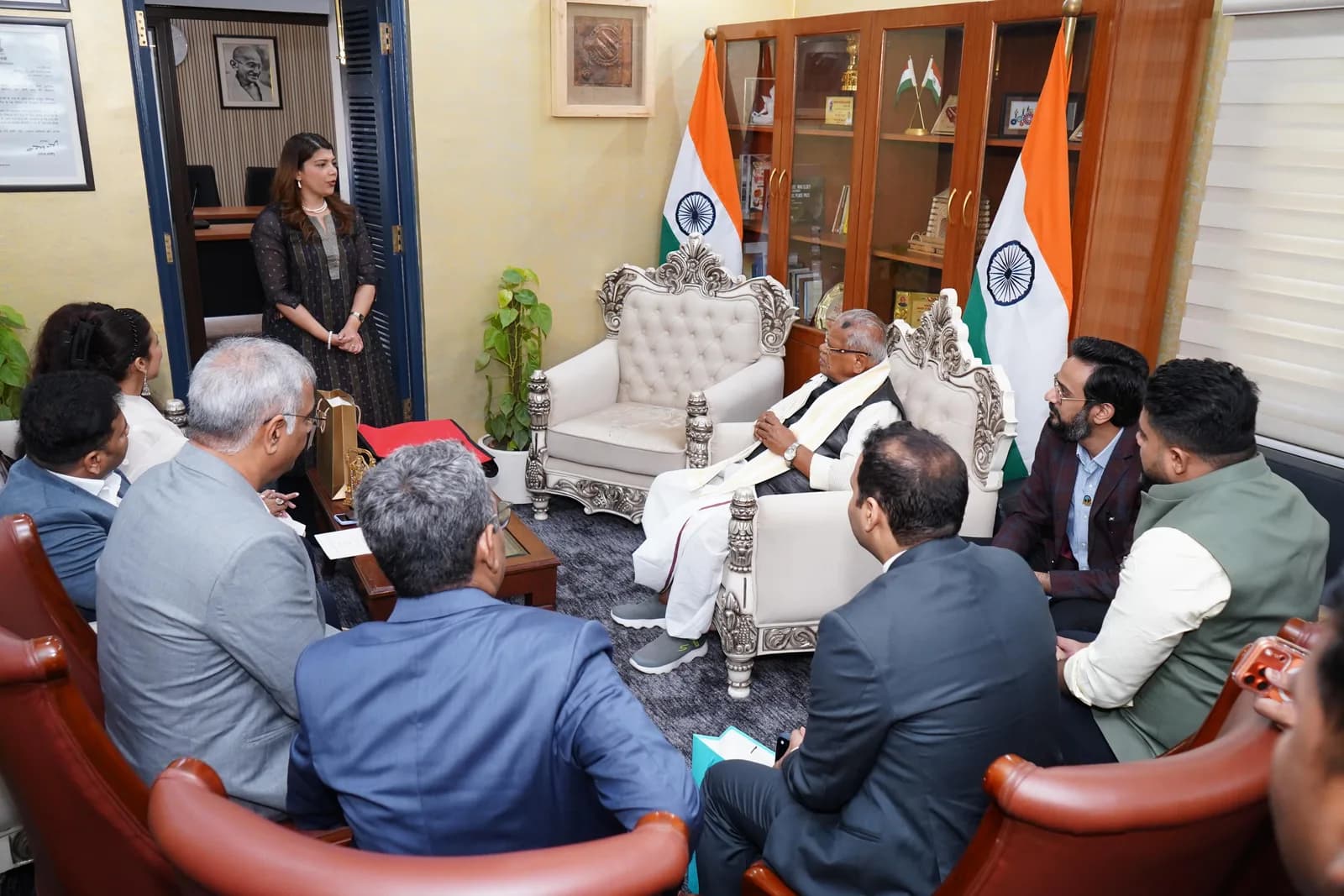 The Summentor Pro team presenting the summit to a minister at his office.